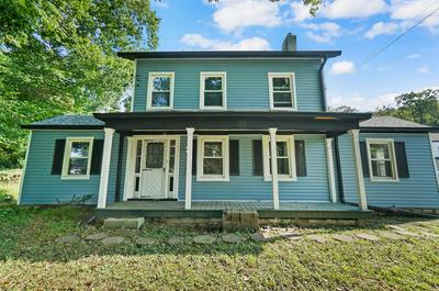 black gutters on blue house